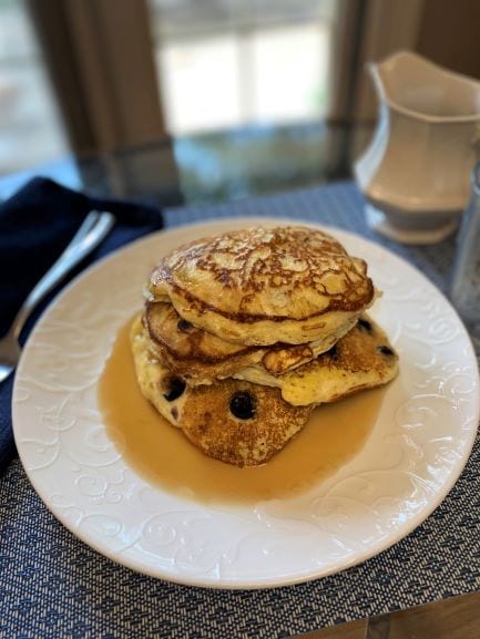 Stacked blueberry pancakes